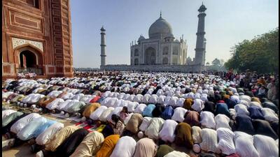 Muslims offer prayers on the occasion of Eid ul-Fitr, at the Taj Mahal in Agra, on Saturday. (PTI) Muslims offer prayers on the occasion of Eid ul-Fitr, at the Taj Mahal in Agra, on Saturday. (PTI)
