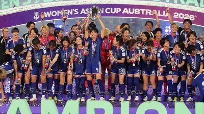 Japanese players celebrate after winning against Australia. (AP) Japanese players celebrate after winning against Australia. (AP)