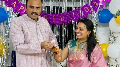 భార్య దివ్యతో ఎస్సై చంద్రశేఖర్ (ఫైల్ ఫొటో)
