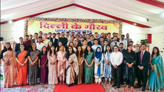 CM Rekha Gupta with young achievers who succeeded in the Civil Services Examination at the “Delhi’s Pride – UPSC Achievers Felicitation Ceremony 2026”. (X-CMODelhi)