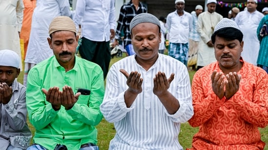Muslims offer prayers on the occassion of Eid at a ground in Nadia, West Bengal.&nbsp;(PTI)