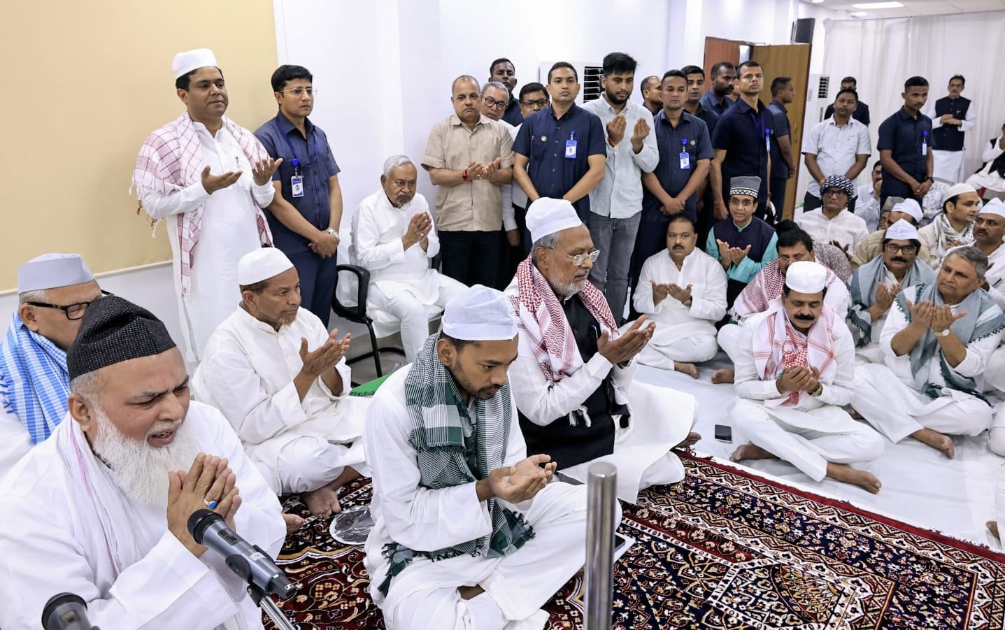 Patna, Mar 18 (ANI): Bihar Chief Minister Nitish Kumar and his son Nishant Kumar attend the Daawat-iftar organised at Nek Samvad Bhawan, in Patna on Wednesday. (ANI Photo) (Rahul Sharma) Patna, Mar 18 (ANI): Bihar Chief Minister Nitish Kumar and his son Nishant Kumar attend the Daawat-iftar organised at Nek Samvad Bhawan, in Patna on Wednesday. (ANI Photo) (Rahul Sharma)
