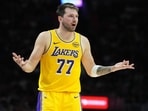 Los Angeles Lakers guard Luka Doncic (77) argues a call during the second half of an NBA basketball game against the Miami Heat Los Angeles Lakers guard Luka Doncic (77) argues a call during the second half of an NBA basketball game against the Miami Heat