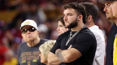 Cam Skattebo watches the action during the game between the Arizona Wildcats and the Arizona State Sun Devils (Getty Images via AFP) Cam Skattebo watches the action during the game between the Arizona Wildcats and the Arizona State Sun Devils (Getty Images via AFP)