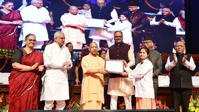 Chief minister Yogi Adityanath and deputy chief minister Brajesh Pathak distributing appointment letters to nursing professionals in Lucknow on Sunday. (HT Photo) Chief minister Yogi Adityanath and deputy chief minister Brajesh Pathak distributing appointment letters to nursing professionals in Lucknow on Sunday. (HT Photo)