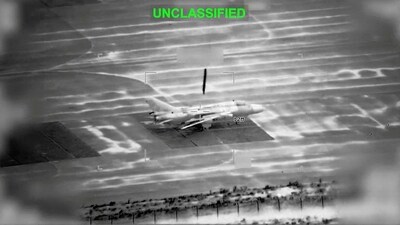 A projectile falls on an aircraft at an unknown location in the still image obtained from a video released by U.S. Central Command (CENTCOM) (via REUTERS)