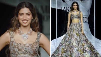 Khusi Kapoor looked resplendent on the ramp at Lakme Fashion Week, dressed by designer Aisha Rao. She wore a resplendent gold and silver lehenga sans dupatta, featuring heavy thread and sequin embroidery. The sleeveless blouse had a sweetheart neckline. The ensemble was completed with a matching high-sitting necklace that appeared like a collar. (@lakmefashionwk/Instagram) Khusi Kapoor looked resplendent on the ramp at Lakme Fashion Week, dressed by designer Aisha Rao. She wore a resplendent gold and silver lehenga sans dupatta, featuring heavy thread and sequin embroidery. The sleeveless blouse had a sweetheart neckline. The ensemble was completed with a matching high-sitting necklace that appeared like a collar. (@lakmefashionwk/Instagram)
