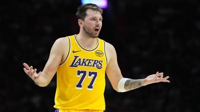 Los Angeles Lakers guard Luka Doncic (77) argues a call during the second half of an NBA basketball game against the Miami Heat (AP) Los Angeles Lakers guard Luka Doncic (77) argues a call during the second half of an NBA basketball game against the Miami Heat (AP)