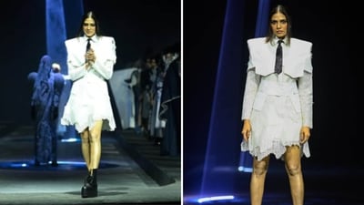 Malavika Mohanan modelled for designer Anurag Gupta, with Manisha Melwani as her stylist. The avant-garde outfit featured a white dress with fine threadwork, full sleeves, yet the skirt stayed above the knees. The hem of the skirt is rough around the edges, and a white cummerbund holds the ensemble together. On top of the dress, Malavika wore a roughly cropped white jacket and a jet-black tie that reached the midriff. The ensemble was completed with high-heeled black boots. (@lakmefashionwk/Instagram) Malavika Mohanan modelled for designer Anurag Gupta, with Manisha Melwani as her stylist. The avant-garde outfit featured a white dress with fine threadwork, full sleeves, yet the skirt stayed above the knees. The hem of the skirt is rough around the edges, and a white cummerbund holds the ensemble together. On top of the dress, Malavika wore a roughly cropped white jacket and a jet-black tie that reached the midriff. The ensemble was completed with high-heeled black boots. (@lakmefashionwk/Instagram)