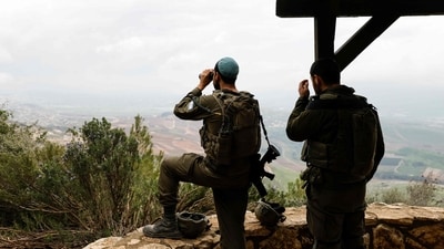 Israeli soldiers take a position along the Israel-Lebanon border on March 7, 2026. (AFP) (AFP) Israeli soldiers take a position along the Israel-Lebanon border on March 7, 2026. (AFP) (AFP)