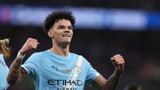 Manchester City's English midfielder #33 Nico O'Reilly celebrates scoring their second goal. (AFP)
