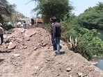 A breach in the Khadakwasla canal’s retaining wall around 2:30 am on Monday flooded the Magarpatta area. (HT) A breach in the Khadakwasla canal’s retaining wall around 2:30 am on Monday flooded the Magarpatta area. (HT)