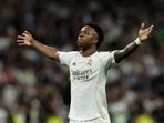 Vinicius Junior celebrates scoring his team's third goal during the Spanish league football match between Real Madrid CF and Club Atletico de Madrid at Santiago Bernabeu Stadium Vinicius Junior celebrates scoring his team's third goal during the Spanish league football match between Real Madrid CF and Club Atletico de Madrid at Santiago Bernabeu Stadium