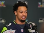 Seattle Seahawks wide receiver Jaxon Smith-Njigba (11) talks to media members at the San Jose Marriott