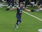 Seattle Seahawks' Jaxon Smith-Njigba celebrates after winning the Super Bowl LX 