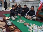 People during a community donation drive organised in support of Iran, in Srinagar, on Monday. (Waseem Andrabi/HT)