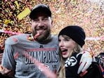 Travis Kelce, left, and Taylor Swift pose after the AFC Championship game against the Buffalo Bills