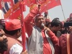 UP minister Sanjay Nishad staging a sit-in at Shringverpur in Prayagraj on March 23. (HT photo)