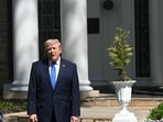 US President Donald Trump speaks to the press after departing from Graceland, the estate of Elvis Presley, in Memphis, Tennessee on March 23, 2026. (Photo by SAUL LOEB / AFP)