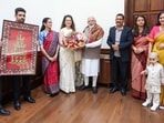 Kangana Ranaut and her family got clicked with Prime Minister Narendra Modi on the occasion of her 40th birthday.