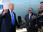 US President Donald Trump speaks to reporters before boarding Air Force One at Palm Beach International Airport on March 23, 2026.