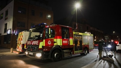 A fire engine leaves the scene after four ambulances belonging to Hatzola, a Jewish community organisation, were set on fire in an incident that the police say is being treated as an antisemitic hate crime, in northwest London, Britain, March 23, 2026. (REUTERS)