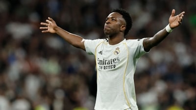 Vinicius Junior celebrates scoring his team's third goal during the Spanish league football match between Real Madrid CF and Club Atletico de Madrid at Santiago Bernabeu Stadium (AFP) Vinicius Junior celebrates scoring his team's third goal during the Spanish league football match between Real Madrid CF and Club Atletico de Madrid at Santiago Bernabeu Stadium (AFP)