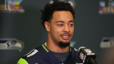 Seattle Seahawks wide receiver Jaxon Smith-Njigba (11) talks to media members at the San Jose Marriott (IMAGN IMAGES via Reuters Connect)