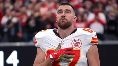 Travis Kelce #87 of the Kansas City Chiefs looks on during the National Anthem prior to the game against the Las Vegas Raiders (Getty Images via AFP) Travis Kelce #87 of the Kansas City Chiefs looks on during the National Anthem prior to the game against the Las Vegas Raiders (Getty Images via AFP)