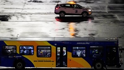 A bus transports plane crash survivors after an Air Canada Express jet collided with a ground vehicle at LaGuardia Airport in Queens, New York, U.S., March 23, 2026.&nbsp; (REUTERS)