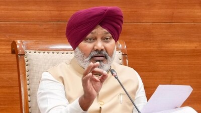 Punjab Finance Minister Harpal Singh Cheema addresses a press briefing on the response to the VAT OTS scheme, in Chandigarh. Punjab Finance Minister Harpal Singh Cheema addresses a press briefing on the response to the VAT OTS scheme, in Chandigarh.