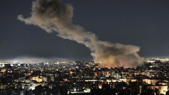 Iran US war: Smoke rises from Israeli airstrikes that struck a building in Dahiyeh, a southern suburb of Beirut, Lebanon. (AP Photo/Bilal Hussein, File) Iran US war: Smoke rises from Israeli airstrikes that struck a building in Dahiyeh, a southern suburb of Beirut, Lebanon. (AP Photo/Bilal Hussein, File)