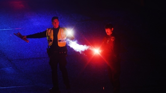 Police close an airport entrance after LaGuardia Airport was closed following an Air Canada Express plane colliding with a fire truck on the tarmac at the airport on March 23, 2026 in New York City.&nbsp;(Getty Images via AFP)