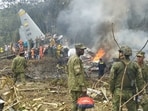 Local residents and military personnel rushed to the crash site to help douse the fire and pull out people from the fire-engulfed plane. 