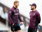 England's Ben Stokes with head coach Brendon McCullum during the practice session