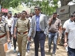 Karnataka State Cricket Association president Venkatesh Prasad and police personnel inspect arrangements at the M Chinnaswamy Stadium in Bengaluru ahead of IPL. (PTI) Karnataka State Cricket Association president Venkatesh Prasad and police personnel inspect arrangements at the M Chinnaswamy Stadium in Bengaluru ahead of IPL. (PTI)