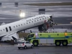 An Air Canada Express flight collided with a fire truck at LaGuardia Airport, killing both pilots and injuring several others. The NTSB is investigating the crash, retrieving critical data recorders to determine the cause of the incident, deemed.
