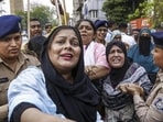 Police personnel detain AIMIM activists during a protest against the Gujarat Uniform Civil Code (UCC) Bill, 2026, in Ahmedabad (PTI)