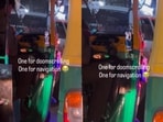 A Bengaluru auto driver was filmed multitasking with two smartphones while driving through city traffic. A Bengaluru auto driver was filmed multitasking with two smartphones while driving through city traffic.