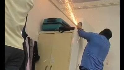 Embedded pipes used by students to dry clothes being removed from a hostel room at IIT Kanpur. (Sourced) Embedded pipes used by students to dry clothes being removed from a hostel room at IIT Kanpur. (Sourced)