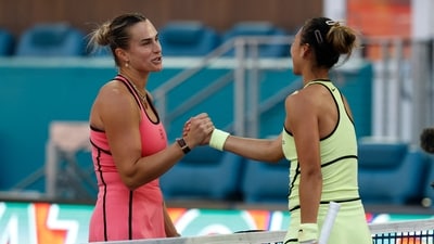 Aryna Sabalenka (L) shakes hands with Qinwen Zheng (CHN) (R) at the net after their match on day 7 of the 2026 Miami Open at Hard Rock Stadium (IMAGN IMAGES via Reuters Connect)