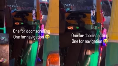 A Bengaluru auto driver was filmed multitasking with two smartphones while driving through city traffic. (Instagram/rucxith) A Bengaluru auto driver was filmed multitasking with two smartphones while driving through city traffic. (Instagram/rucxith)