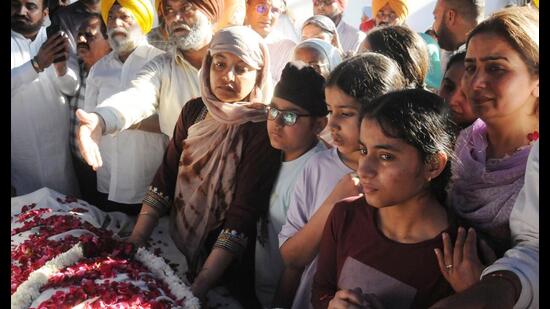 Family of the deceased PSWC district manager Gagandeep Singh Randhawa mourn. (HT Photo)