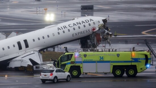 An Air Canada Express flight collided with a fire truck at LaGuardia Airport, killing both pilots and injuring several others. The NTSB is investigating the crash, retrieving critical data recorders to determine the cause of the incident, deemed. (Bloomberg)