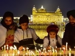 Devotees light candles and oil lamps at Golden Temple on the occasion of birth anniversary of Guru Gobind Singh. (HT File Photo) Devotees light candles and oil lamps at Golden Temple on the occasion of birth anniversary of Guru Gobind Singh. (HT File Photo)