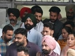 Former Punjab minister Laljit Singh Bhullar (green turban) being produced in Amritsar court on Tuesday. (Sameer Sehgal/HT)