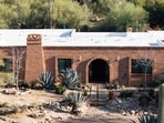 An aerial view shows the home of Nancy Guthrie, the missing mother of "Today" show host Savannah Guthrie, on Friday, March 6, 2026, in Tucson, Ariz. (AP Photo/Rebecca Noble)