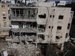 Iran US war: This picture shows a damaged building at the site of an Iranian missile strike in Tel Aviv on March 24, 2026.
