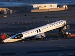 The wreckage of an Air Canada Express jet that collided with a ground vehicle at New York's LaGuardia Airport on Monday in Queens, New York.