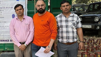District Food and Supplies Controller (DFSC) officials with the seized cylinders. (HT) District Food and Supplies Controller (DFSC) officials with the seized cylinders. (HT)